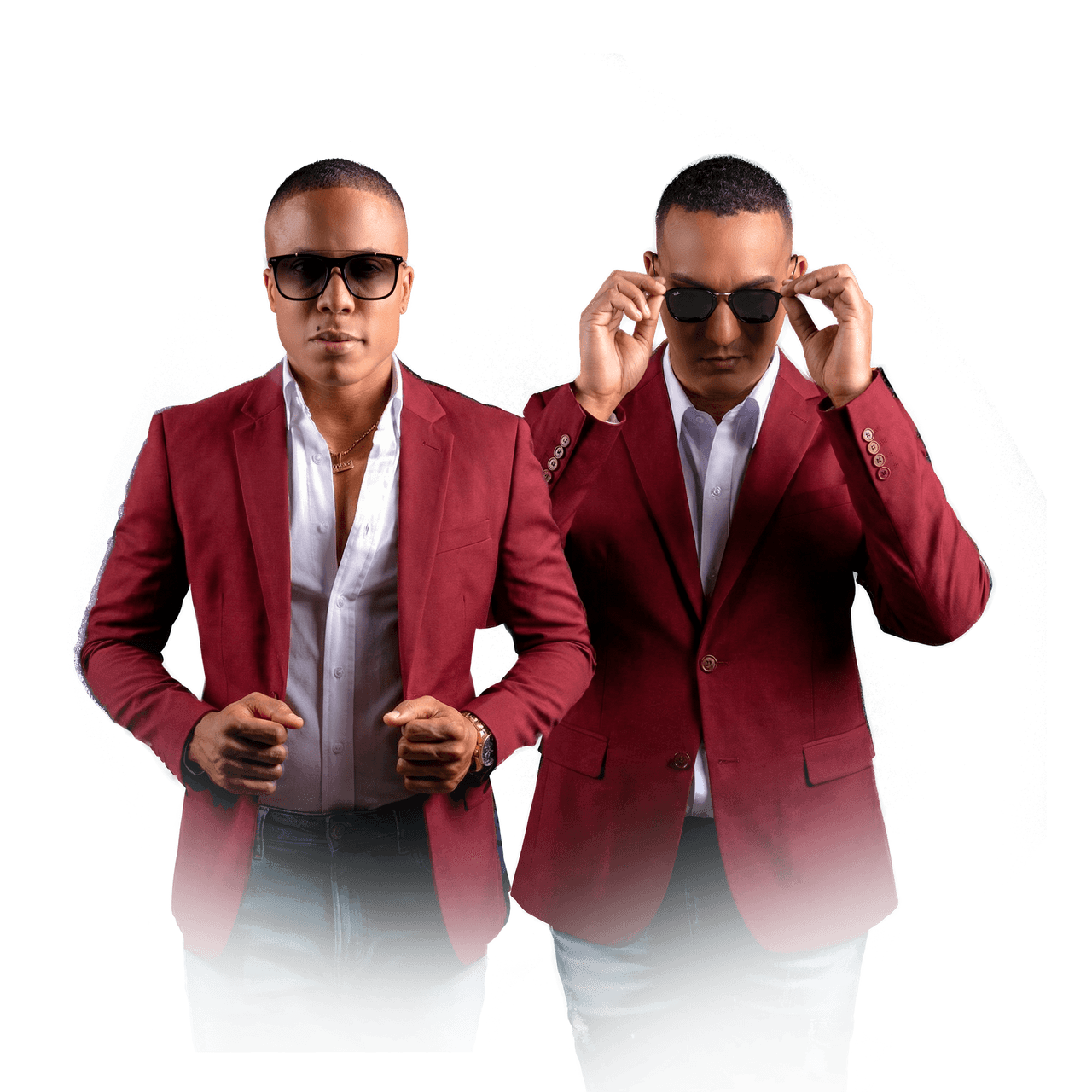 Rafael Berroa «Chiquito» y Emmanuel Frías con chaquetas rojas y gafas de sol