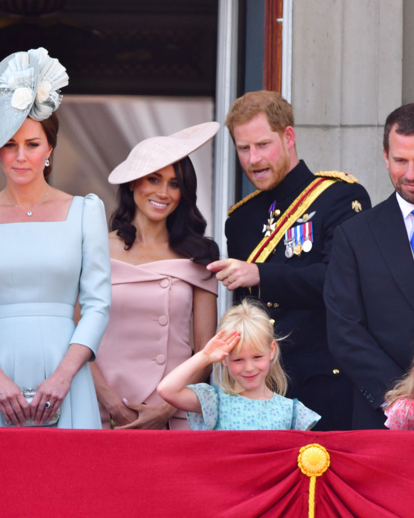 LONDON, ENGLAND - JUNE 09:  Meghan, Duchess of Sussex and Prince Harry, Duke of Sussex stand on the balcony of Buckingham Palace during the Trooping the Colour parade on June 9, 2018 in London, England.  (Photo by James Devaney/FilmMagic)
