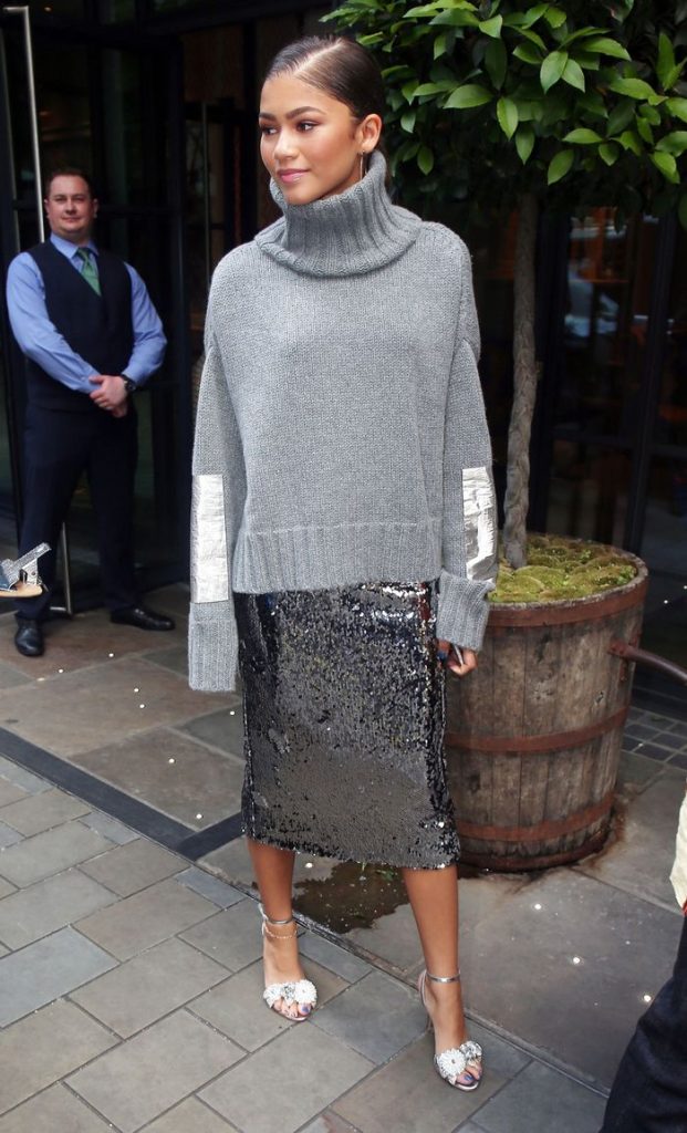 ** RIGHTS: ONLY UNITED STATES, BRAZIL, CANADA ** London, UNITED KINGDOM  - *EXCLUSIVE*  - Singer/Actress Zendaya Coleman looks fashionable in baggy jumper and metallic sequined skirt as she's snapped posing with fans while leaving hotel in London, UK. Zendaya is currently in London promoting 'Spider-Man: Homecoming.'

Pictured: Zendaya Coleman

BACKGRID USA 15 JUNE 2017 

USA: +1 310 798 9111 / usasales@backgrid.com

UK: +44 208 344 2007 / uksales@backgrid.com

*UK Clients - Pictures Containing Children
Please Pixelate Face Prior To Publication*