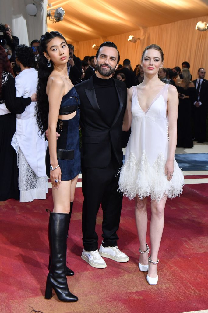 South Korean actress Jung Hoyeon (L), French designer Nicolas Ghesquière (C) and US actress Emma Stone (R) arrive for the 2022 Met Gala at the Metropolitan Museum of Art on May 2, 2022, in New York. - The Gala raises money for the Metropolitan Museum of Art's Costume Institute. The Gala's 2022 theme is "In America: An Anthology of Fashion". (Photo by ANGELA  WEISS / AFP) (Photo by ANGELA  WEISS/AFP via Getty Images)